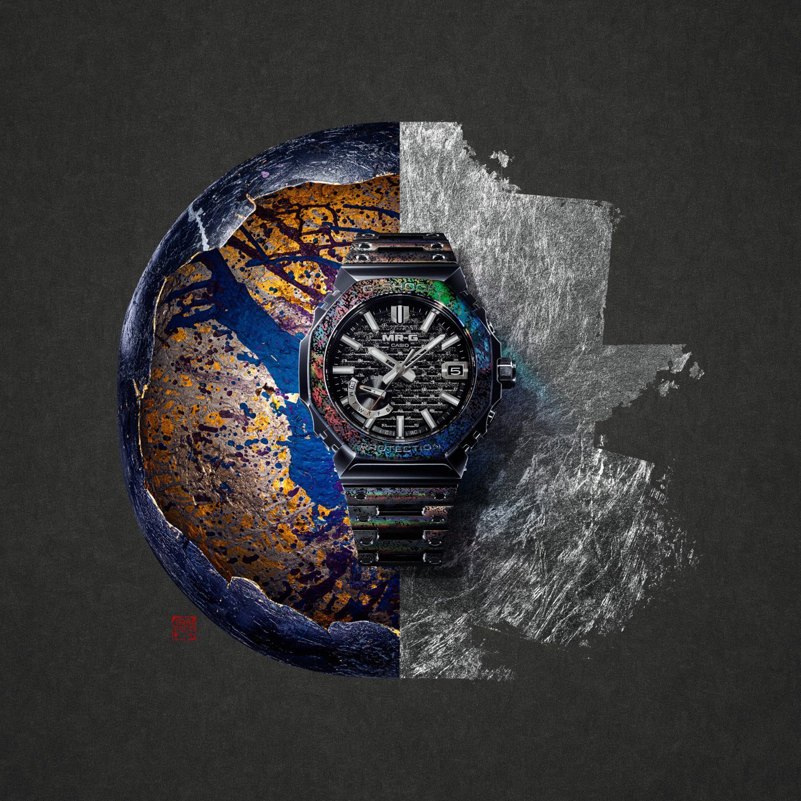 The G-Shock MRG-B2100HR-1A in front of Hiroto Rakusho's metal leaf artwork, half gold and blue leaf, half silver