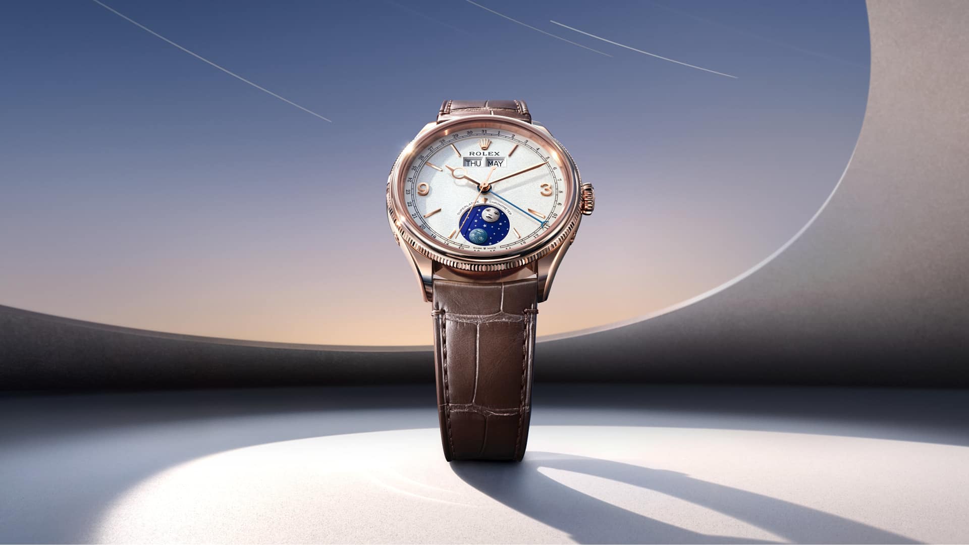 Rolex Perpetual Padellone in Everose gold with an intense white dial on a brown alligator strap