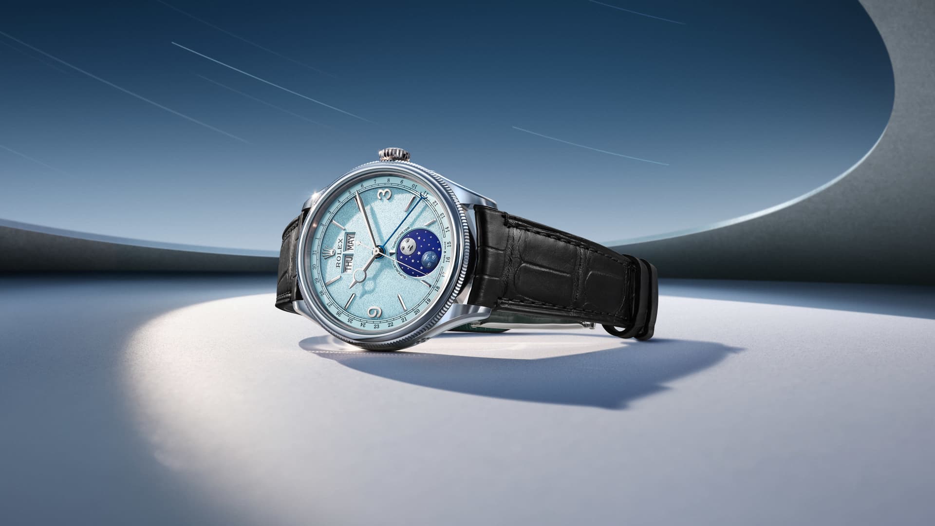 Rolex Perpetual Padellone in 950 platinum with an ice blue dial on a black alligator strap